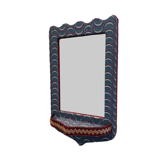 Fabric covered mirror with shelf